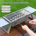 Small foldable portable charcoal grill for outdoor cooking
