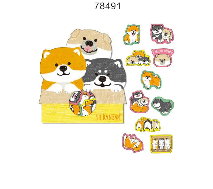 Pack of irregular-shaped dog-themed stickers in black, light brown, and orange colours for journal decoration.