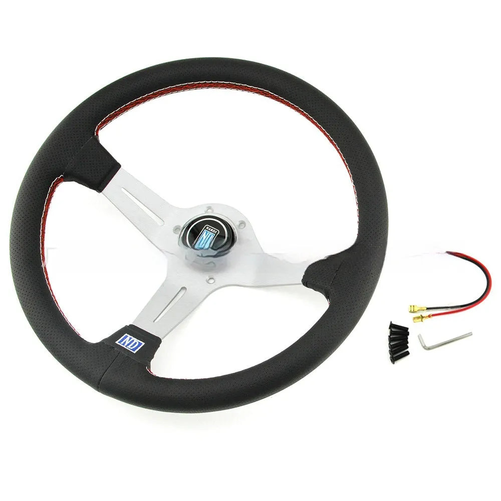 14-inch leather steering wheel with a concave centre section, shown with a silver skeleton frame
