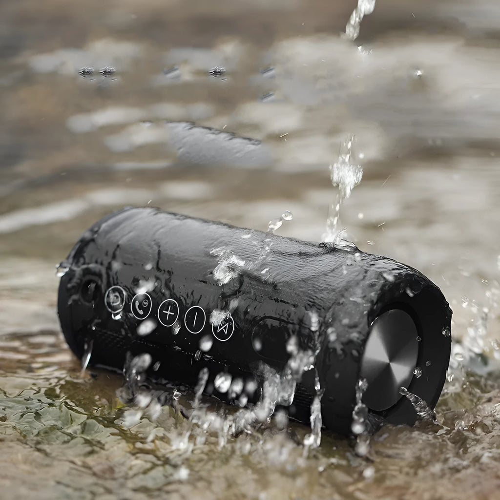 Waterproof portable Bluetooth outdoor speaker in black, camouflage, grey, or red colours.