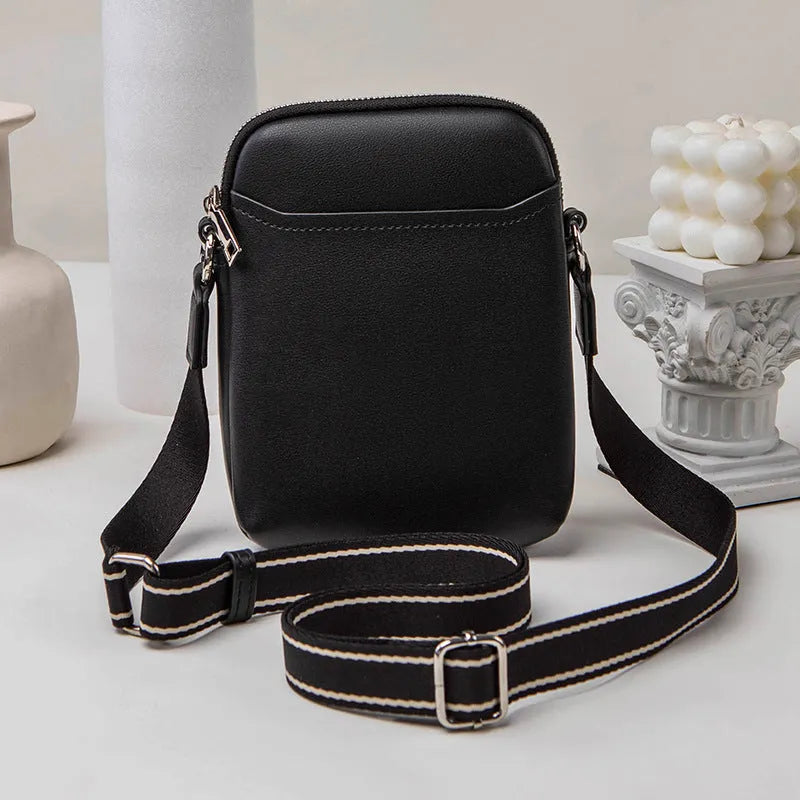 Solid colour mobile phone crossbody bag for women in black, beige, khaki, or green.