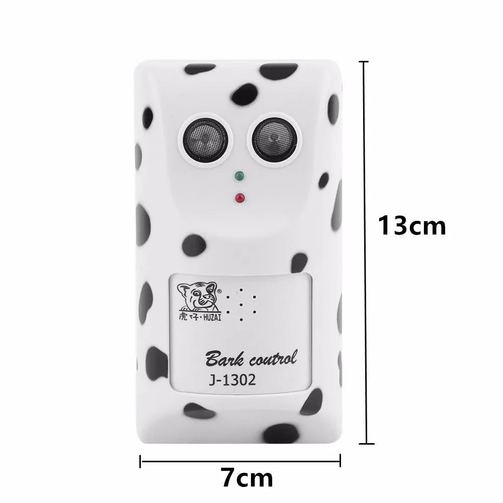 White anti-barking ultrasonic dog repeller mounted on a wall with rotary holder, 7x13x5cm