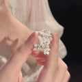 Three-dimensional flower jasmine flower ring in cream sweet girl style with open mouth design, zinc alloy with electroplated finish