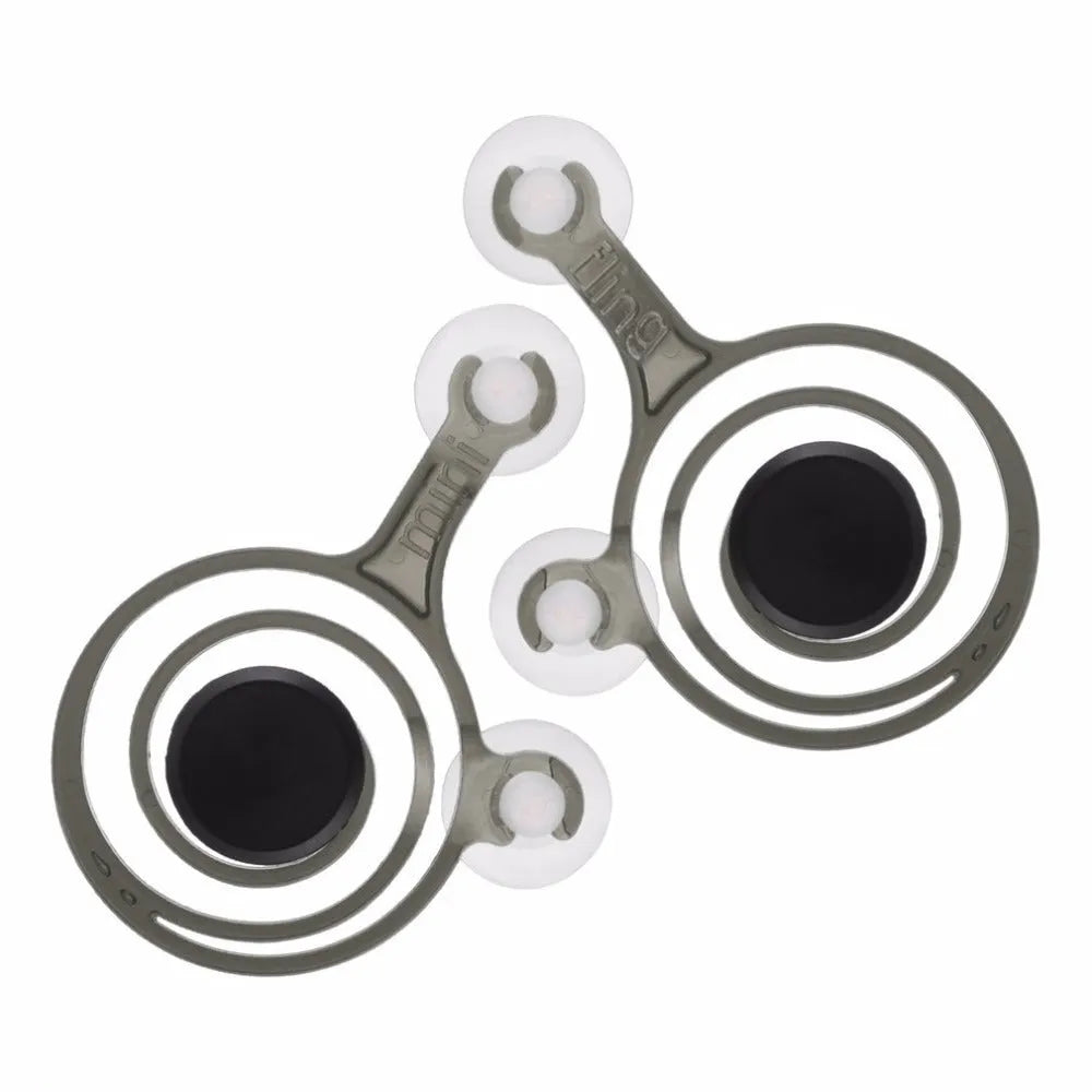 Pair of clear and black universal mini joysticks for mobile phone touch screen gaming with drawstring bag on white background