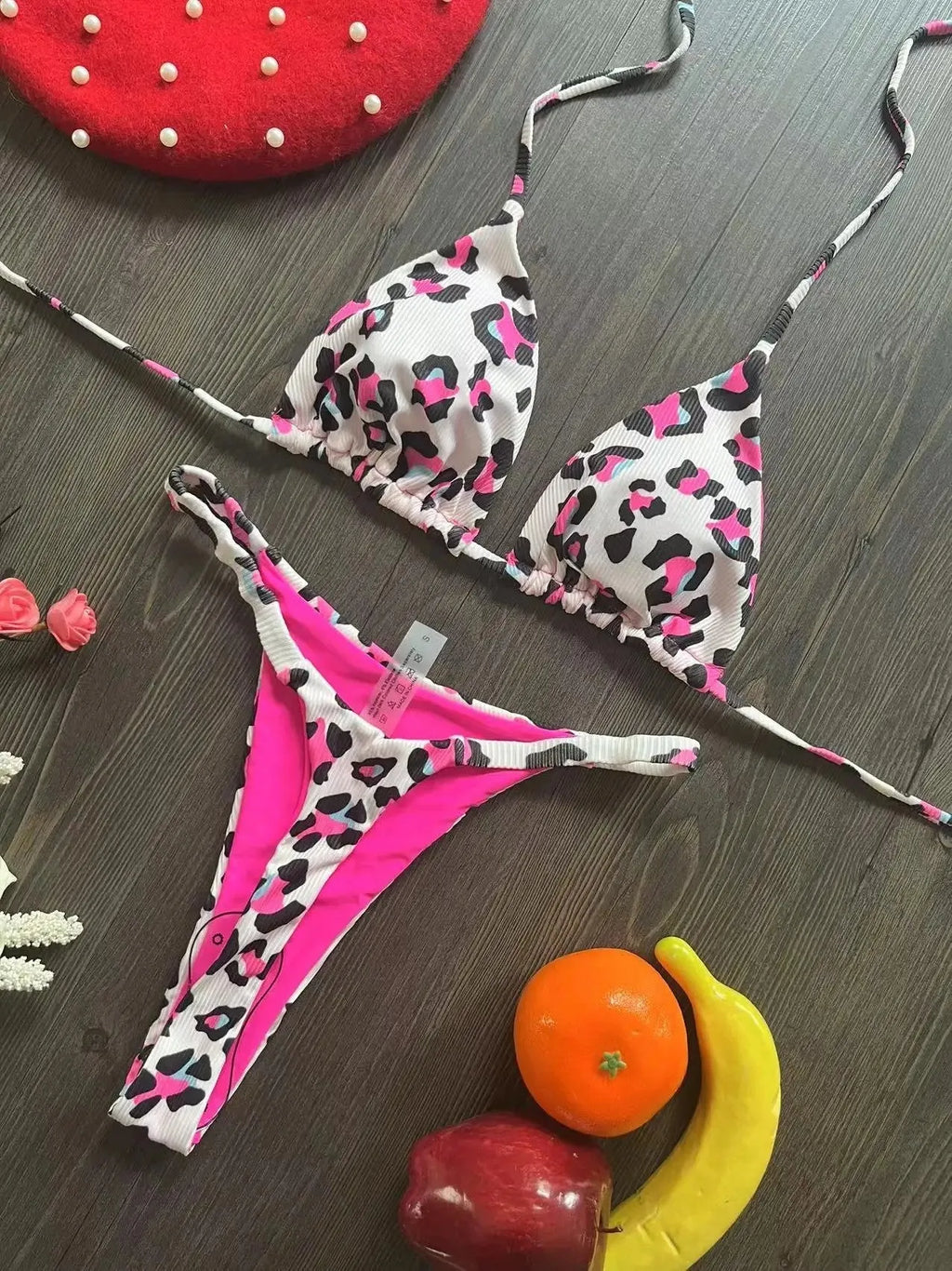 Women's printed nylon bikini with briefs style and cotton lining for swimming sports.