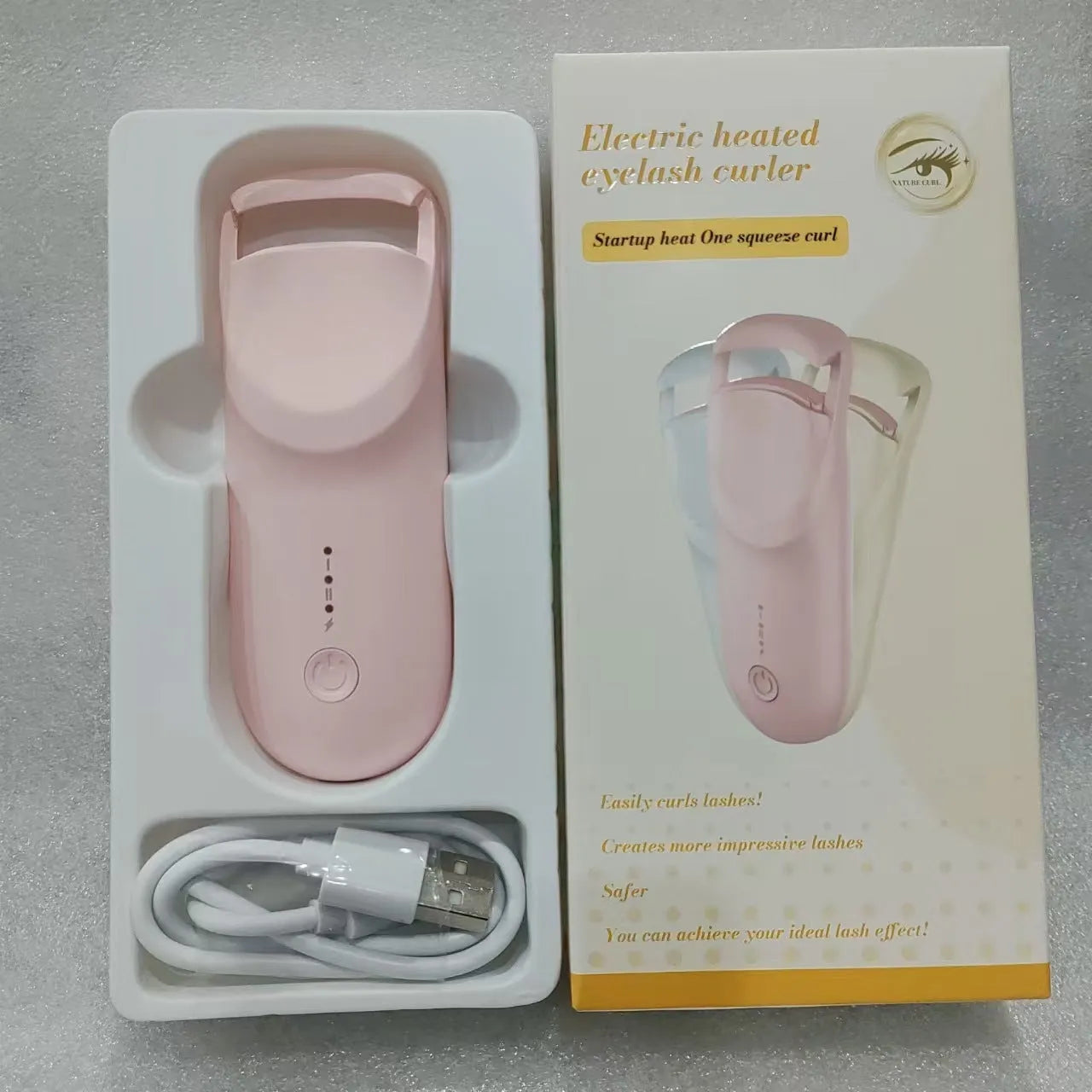 USB electric heating eyelash curler in choice of colours including vanilla apricot, maca pink, and cream white.