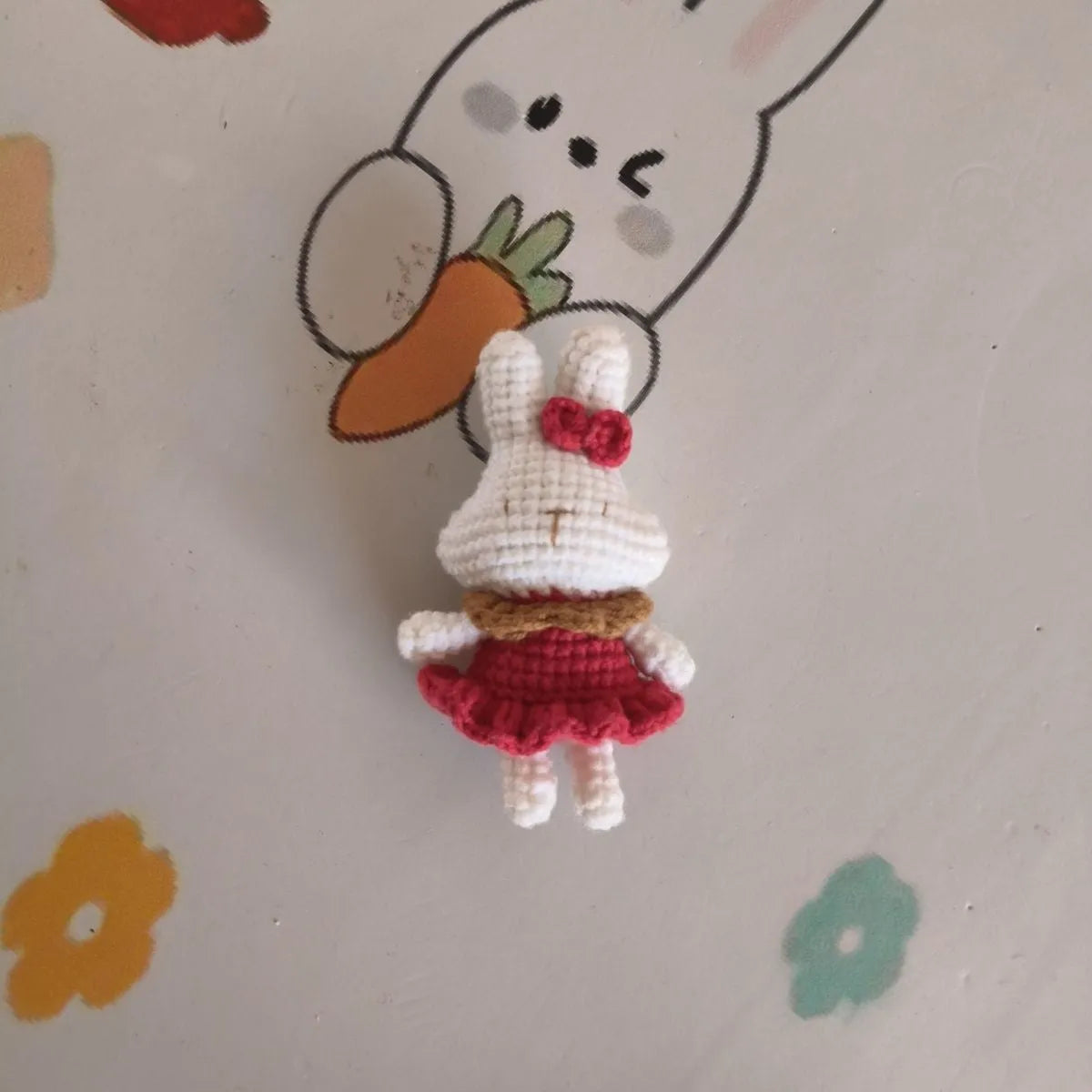 Hand-crocheted wool rabbit key chain pendant in amigurumi style