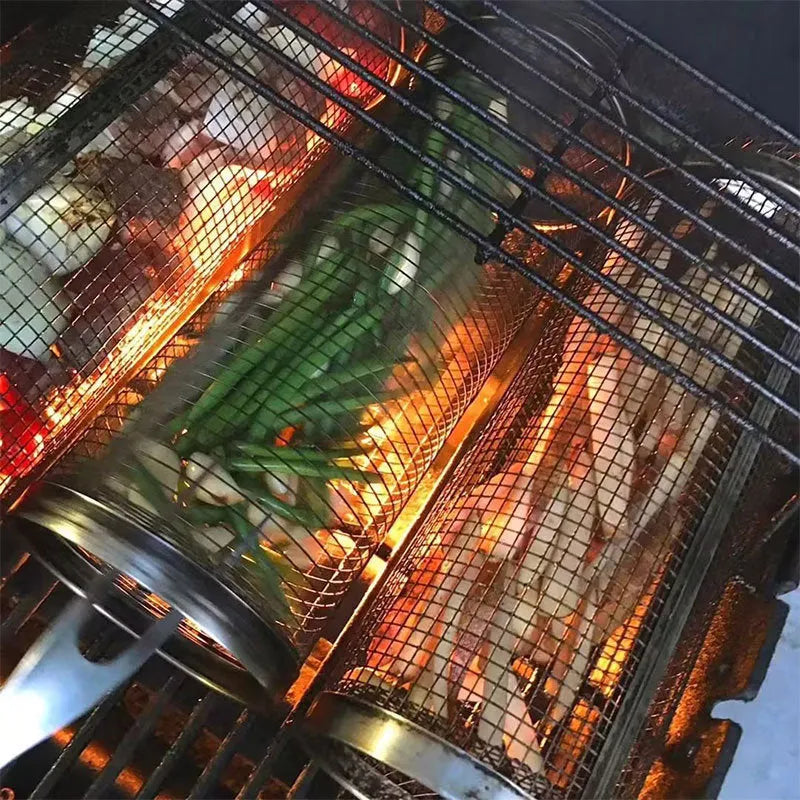 Rolling grill basket iron wire mesh 20x10x10cm with hook, filled with vegetables on a barbecue