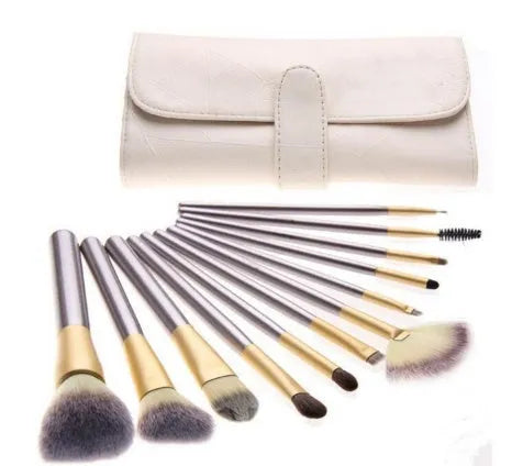 Persian makeup brush set with rice white bristles and champagne colour handles displayed on white background