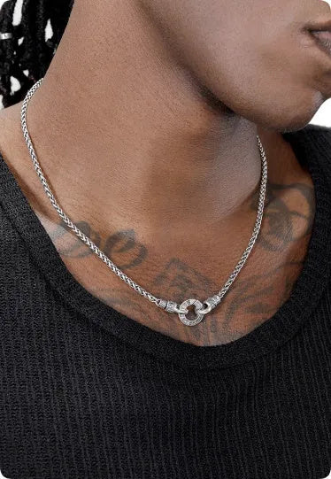 A woman's S925 sterling silver clavicle necklace with a small polished pendant on a choice of 50cm, 55cm, or 60cm chain.