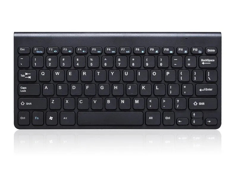 Black wireless keyboard and mouse set with 4G USB receiver on wooden desk