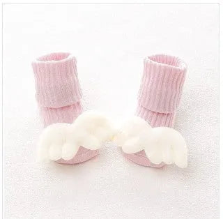 Cotton baby floor socks in multiple designs including panda, bow, and star patterns.
