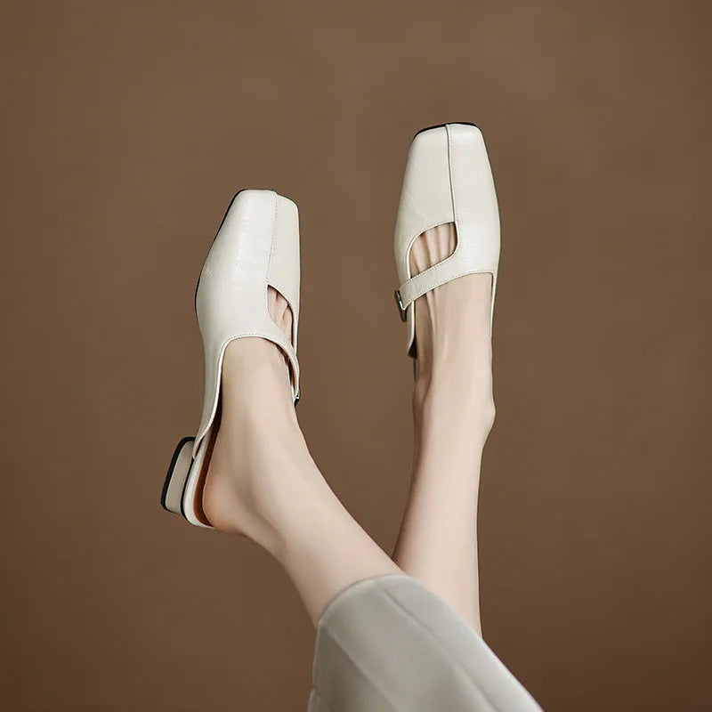 Women's square-toe outdoor slippers in black with a low heel and rubber sole.