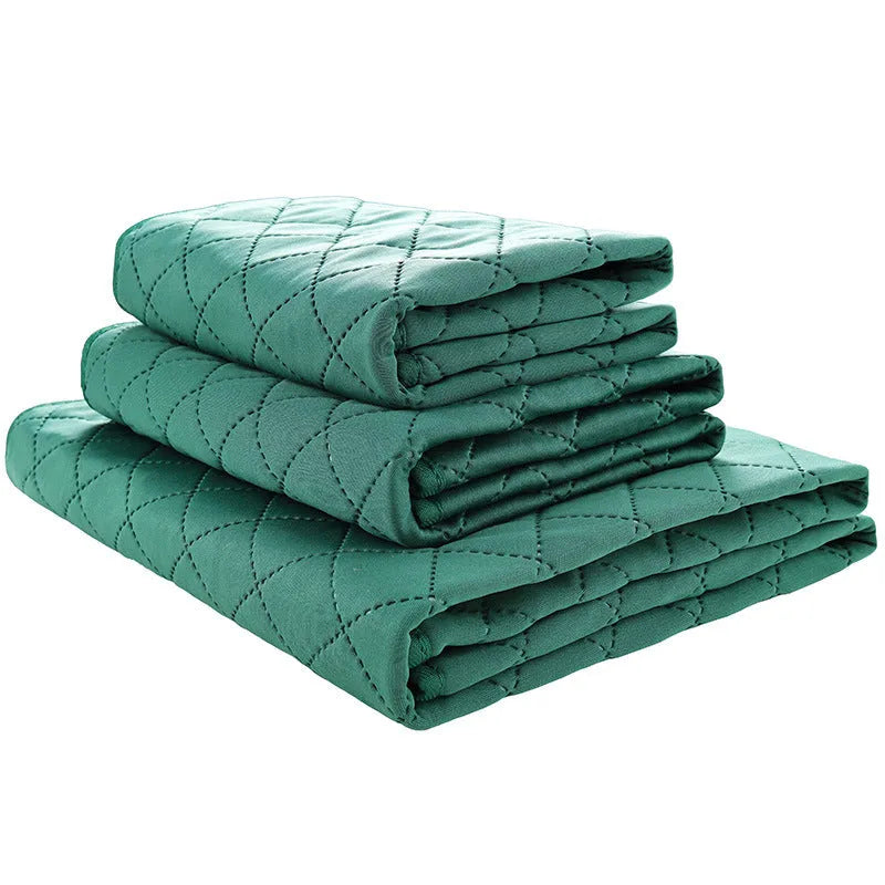 Natural bamboo fibre pet training pad in green colour, moisture-proof and deodorant, shown on a floor
