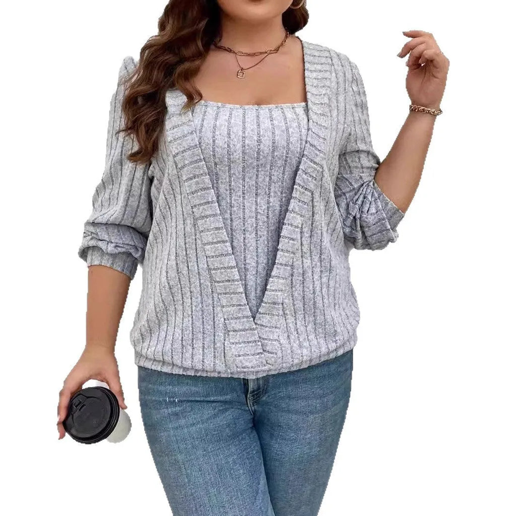 Women's solid colour rib fabric false two-piece suit with V-neck and long sleeves.