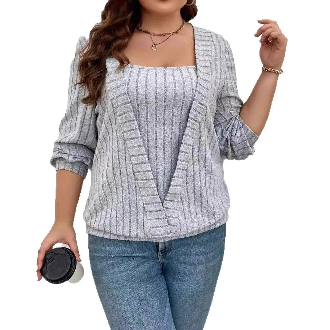 Women's solid colour rib fabric false two-piece suit with V-neck and long sleeves.