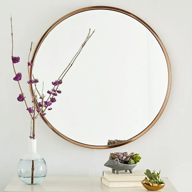 Round metal frame bathroom wall mirror in black finish showing 30cm diameter