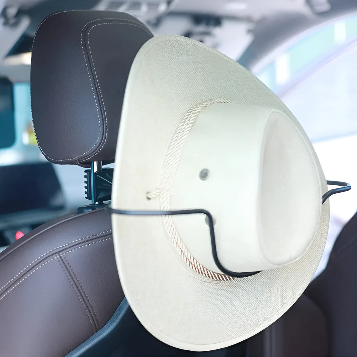 Black metal snap-on hat bracket for car interior display stand holding a hat
