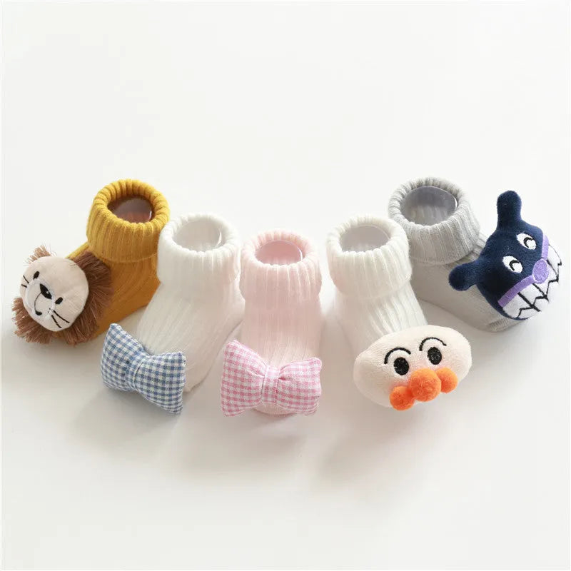 Cotton baby floor socks in multiple designs including panda, bow, and star patterns.