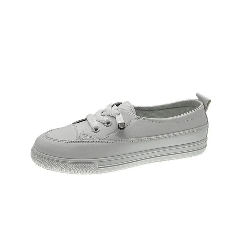 White women's sports breathable shoes with flat heel, round toe, lace-up front, and rubber sole