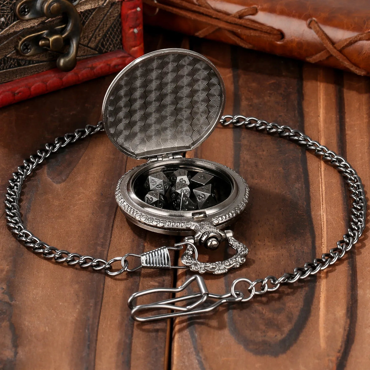 Bronze dice set with 3D carved pocket watch showing seven polyhedral metal dice inside zinc alloy case