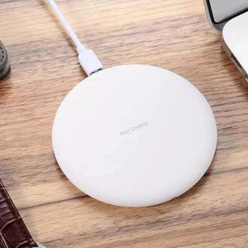 Qi certified 10W wireless charger pad in black rubber oil shell with Micro USB port and indicator light