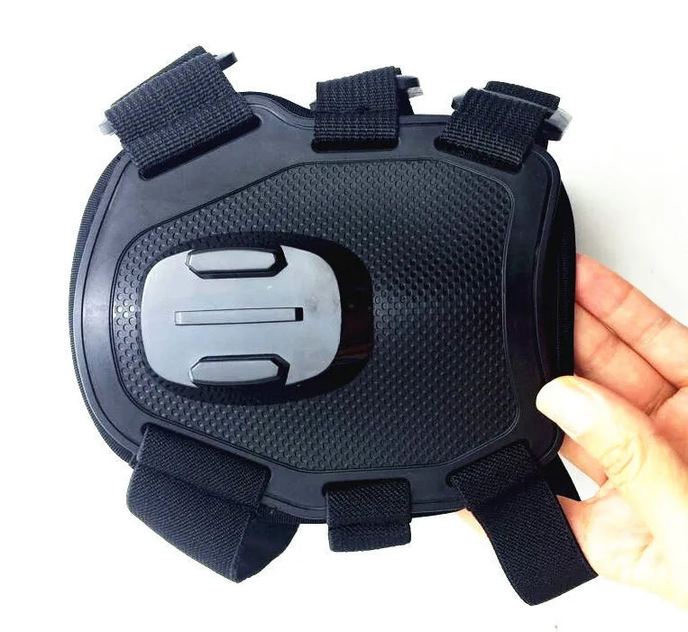 Black GoPro dog chest strap back mount harness on a dog, adjustable padded fit
