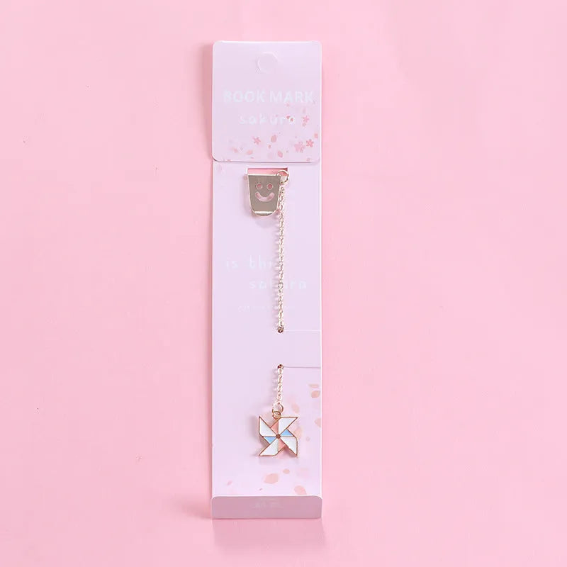 Metal bookmark with cartoon pendant in choice of animal and object designs