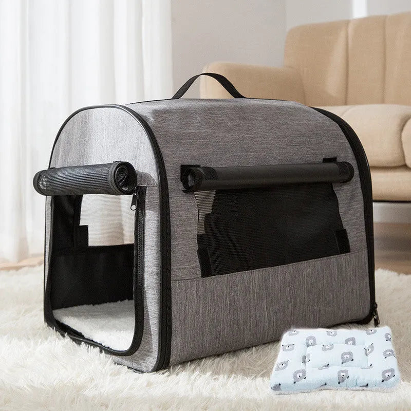 Grey portable dog cage house with mesh panels and roll-up sunshade for travel