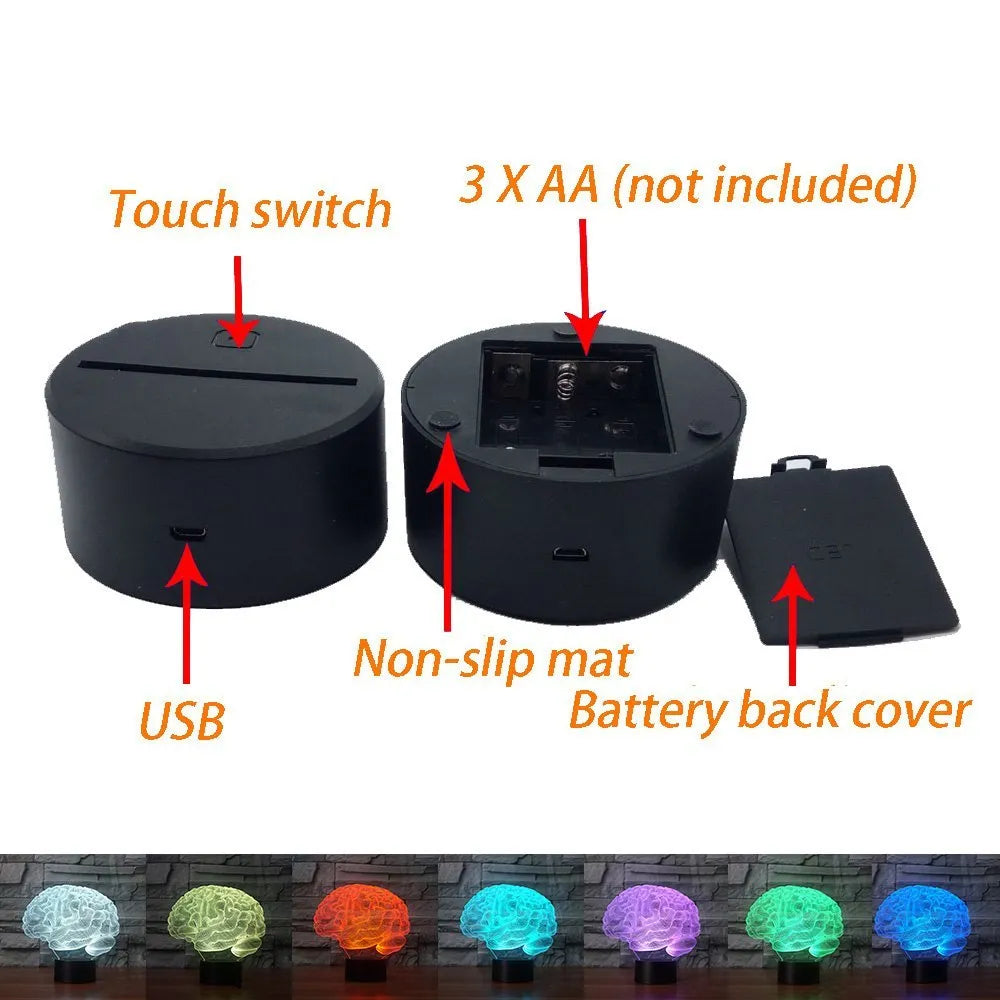 3D acrylic brain hologram LED desk lamp with black base and remote control on a wooden table.