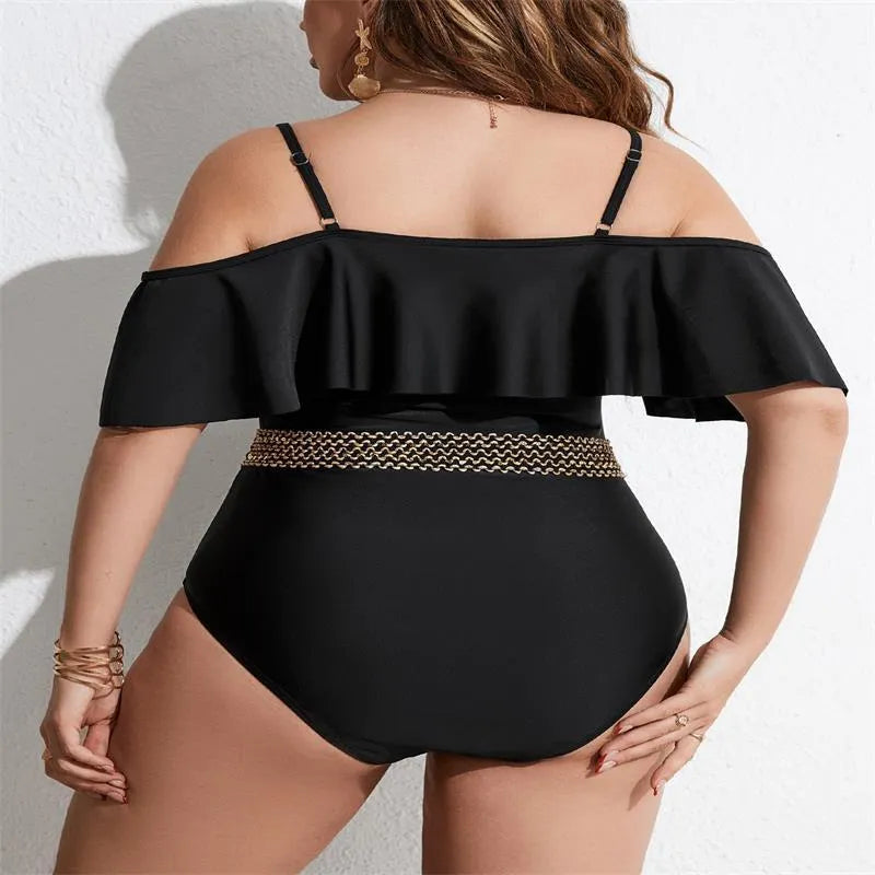 Women's solid black one-piece polyester swimsuit on a hanger