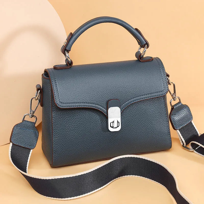 Korean commuter women's cross-body bag in genuine leather, oval shape, sandwich pocket, 21x18x9cm