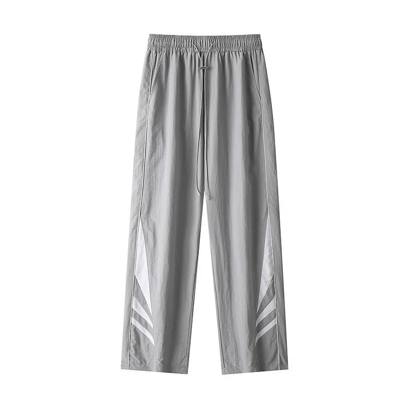 Men's black straight-leg summer trousers with an elastic waistband on a plus-size model