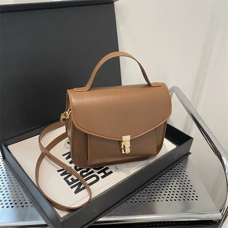 Retro style horizontal square messenger bag in PU leather with crossbody strap