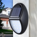 Black rectangular LED solar wall light with integrated solar panel on top
