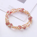 Handmade three-ring crystal bracelet with tourmaline, strawberry quartz and amethyst gemstones