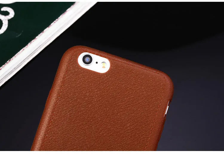 Genuine leather iPhone case with TPU bumper in Black, Brown, Navy Blue, and Wine Red colours for multiple models.