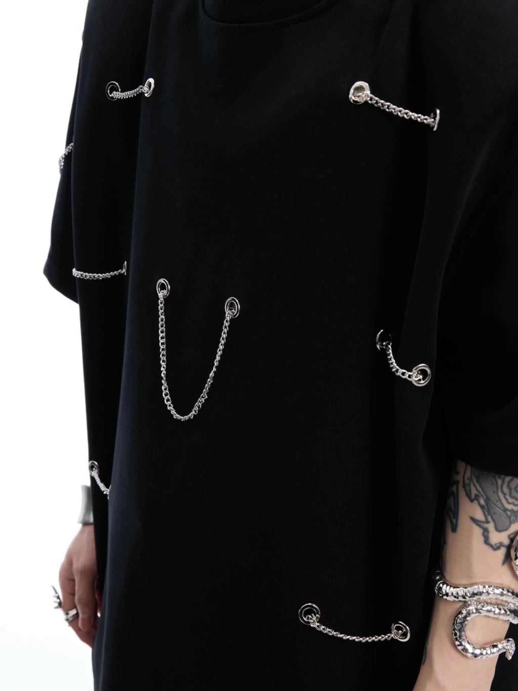Black heavy cotton t-shirt with metal chain padded shoulder detail, round neck, short sleeves