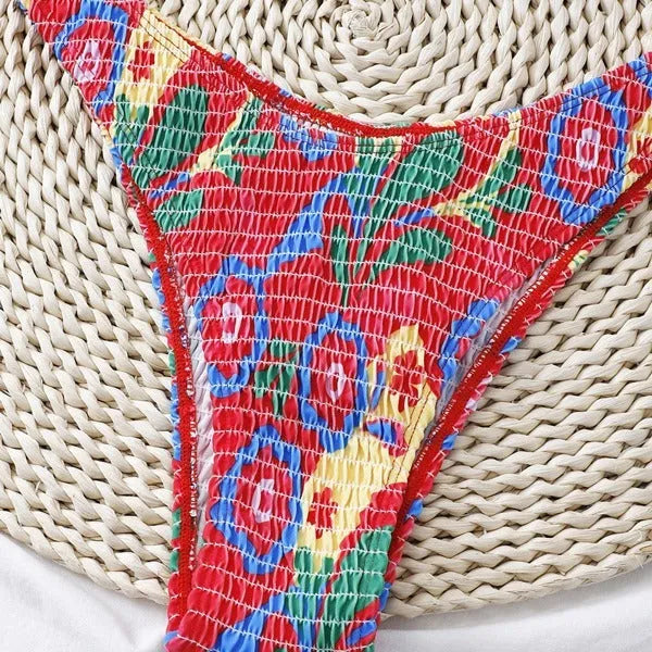 Red floral print women's two-piece underwire bikini set on a mannequin.