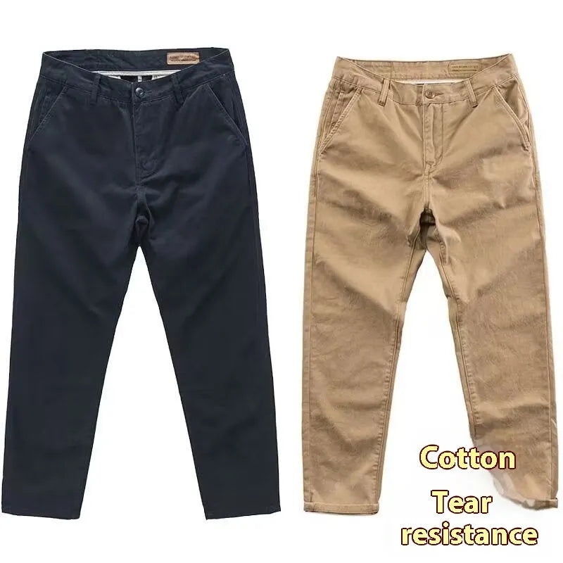 Men's slim fit casual trousers in grey with a straight leg design, made from a micro-elastic fabric blend.