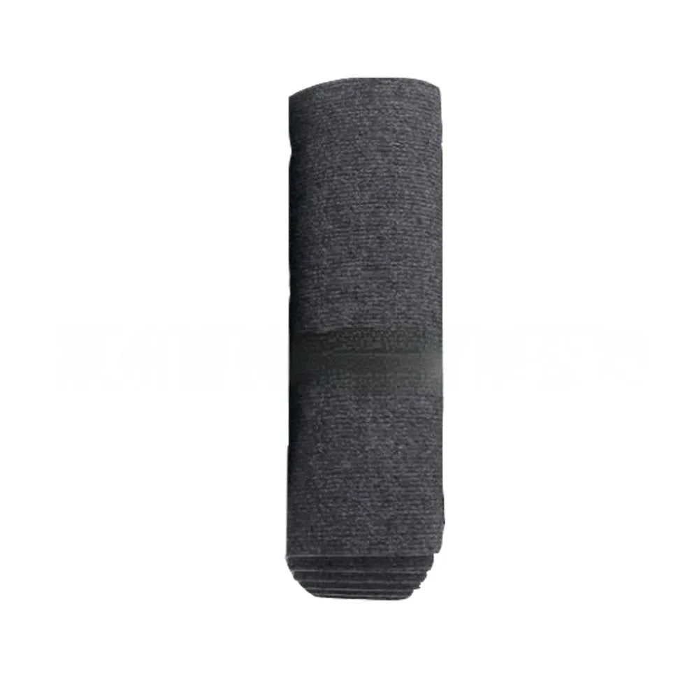 Self-adhesive cat scratch carpet mat in beige, trimmed to fit sofa arm, with scissors and roll packaging