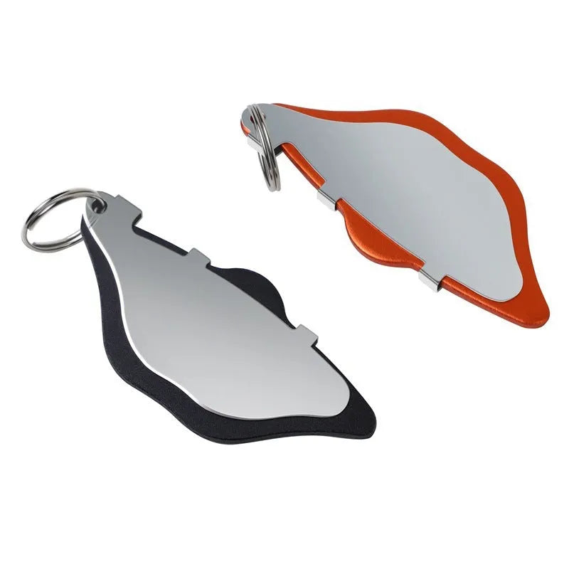 Black and orange mountain bike disc brake pads with a scratch-proof design.