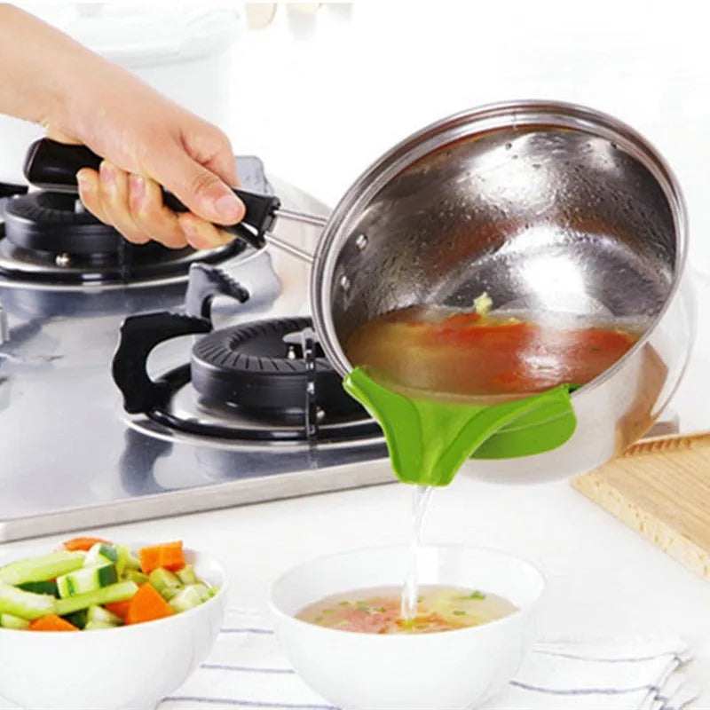 Green silicone kitchen funnel with clamp for securing to round pot edges