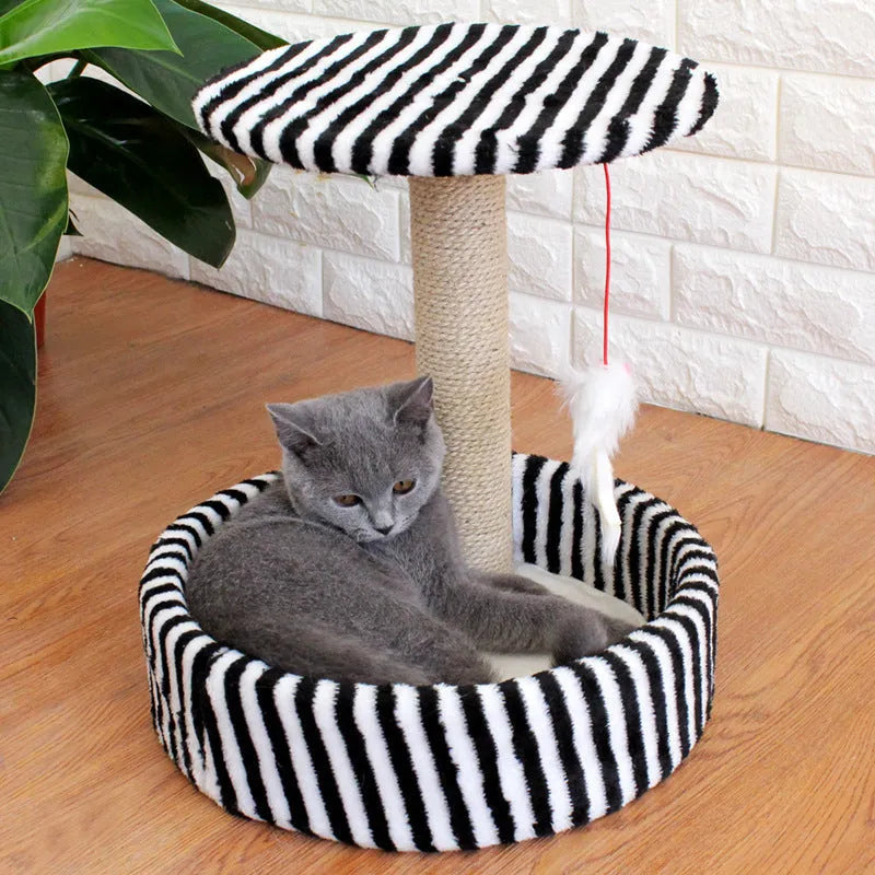 Small cat tree with plush cave and sisal scratching posts in beige, with top platform for jumping