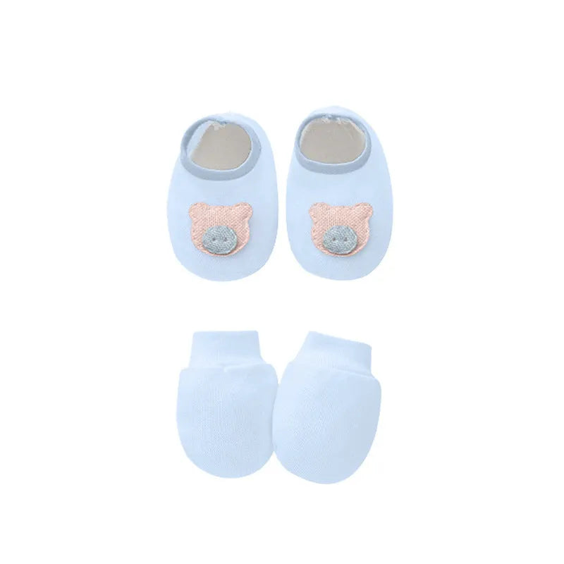 Cotton baby gloves and foot cover set in multiple colours including light blue, navy blue, pink, and camel