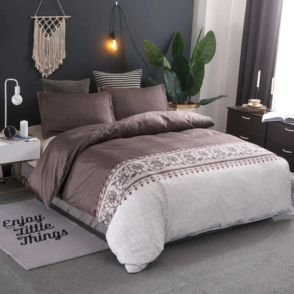 Plain weave polyester duvet cover set in solid colour or floral pattern on a bed