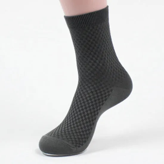 Men's bamboo fibre socks in a small square pattern, shown in navy blue colour.