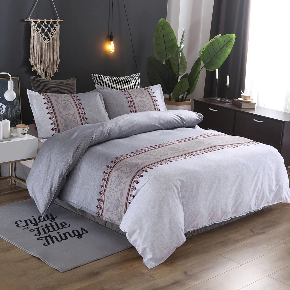 Plain weave polyester duvet cover set in solid colour or floral pattern on a bed
