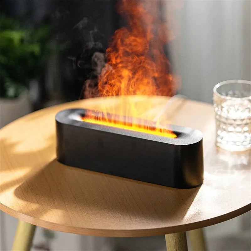 White square ultrasonic flame aroma diffuser and humidifier with LED light on a table.