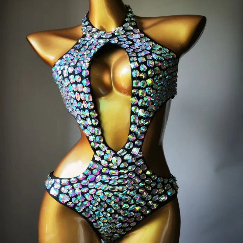 Women's black mesh diamond one-piece swimsuit on a mannequin, showing the front design.